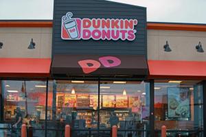 An open Dunkin’ Donuts shop at the corner of Dorchester Avenue and Boston Street in Dorchester offered a welcome glow during the lock-down. Boston Globe